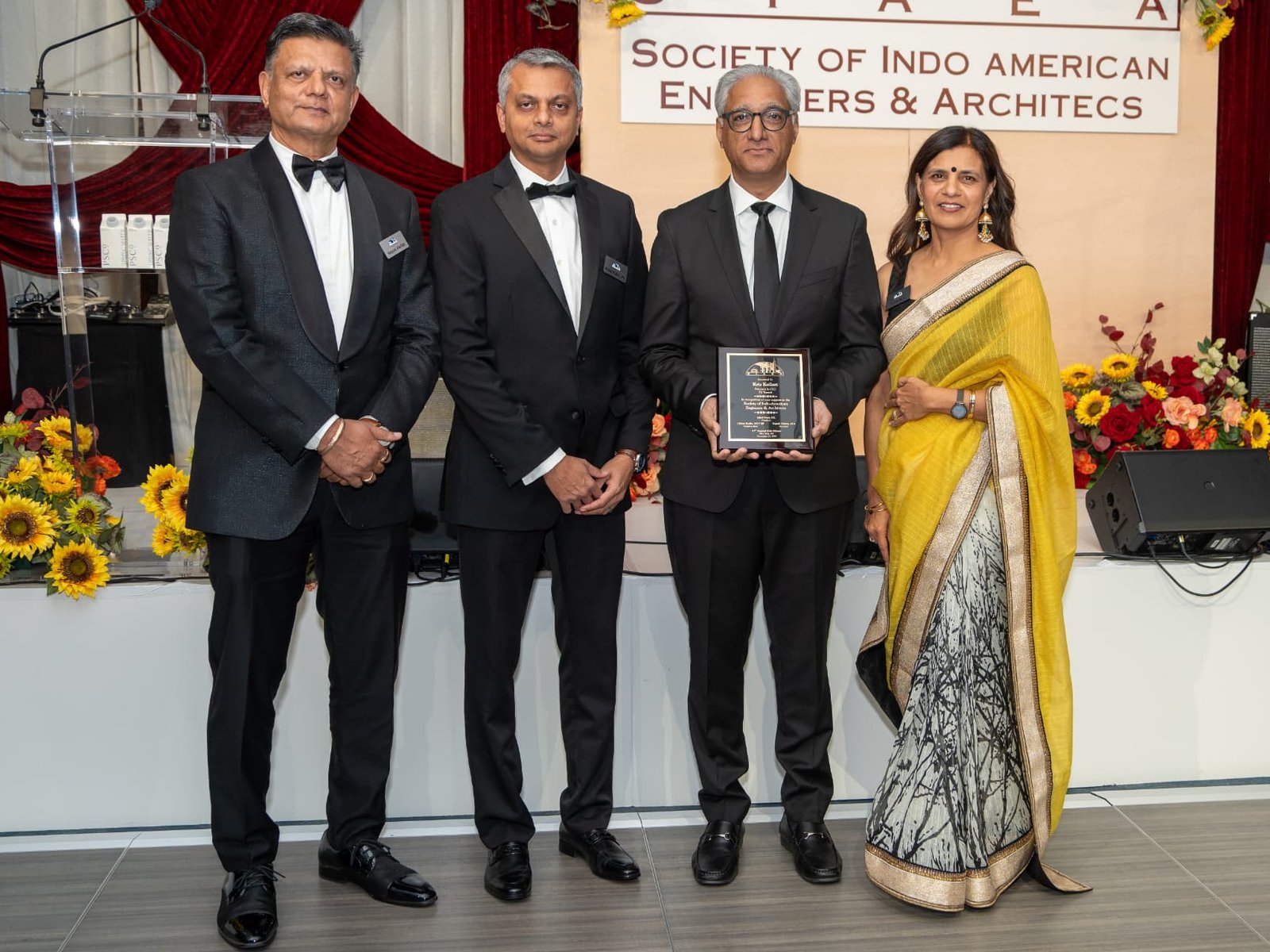 SIAEA leadership presenting a recognition award at the annual gala